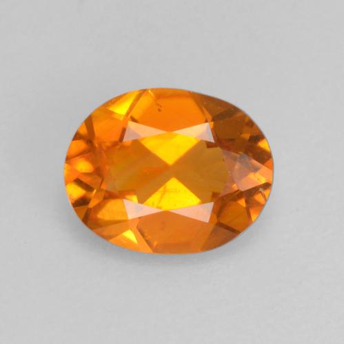 Clinohumita laranja natural 0,52ct, corte oval, VS-SI