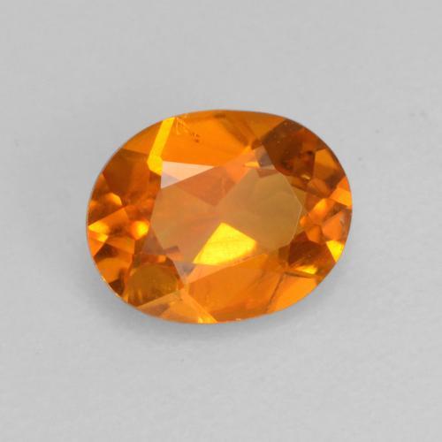 Clinohumita laranja natural 0,52ct, corte oval, VS-SI