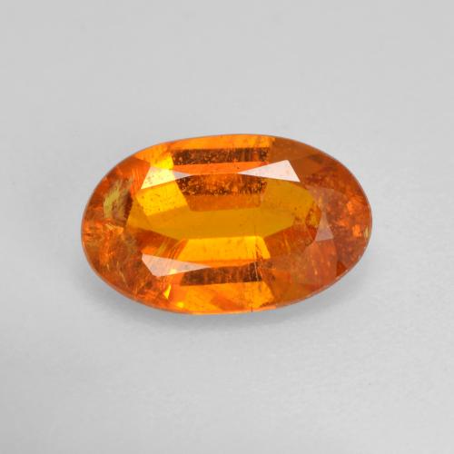 Clinohumita laranja avermelhado Natural 1.42ct, Corte Oval, VS-SI