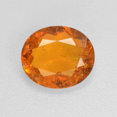 Clinohumita laranja natural 1,45ct, corte oval, SI