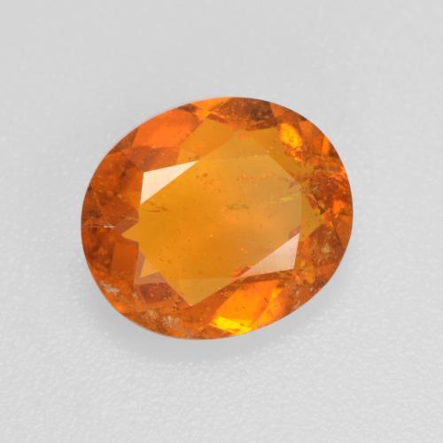 Clinohumita laranja natural 1,45ct, corte oval, SI