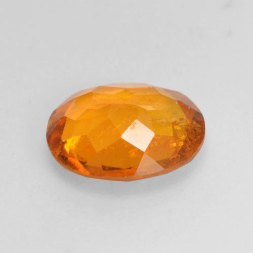 Clinohumita laranja natural 1,45ct, corte oval, SI