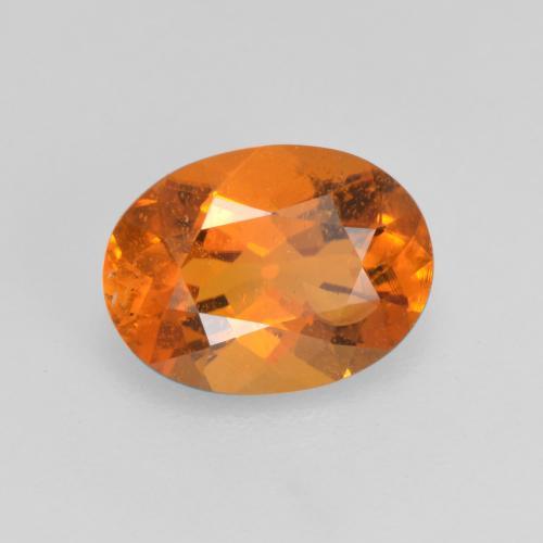Clinohumita laranja natural 1,21ct, corte oval, SI