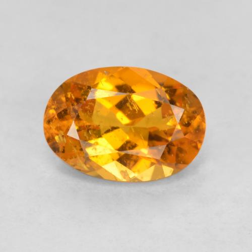 Clinohumita laranja natural 0,85ct, corte oval, SI-I1