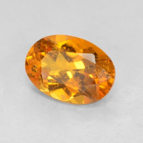 Clinohumita laranja natural 0,85ct, corte oval, SI-I1