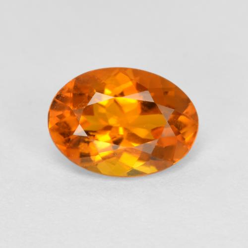 Clinohumita laranja natural 0,74ct, corte oval, SI