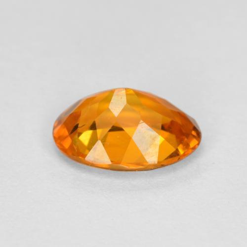 Clinohumita laranja natural 0,74ct, corte oval, SI