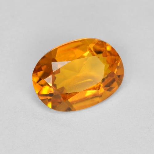 Clinohumita laranja natural 0,41ct, corte oval, VS
