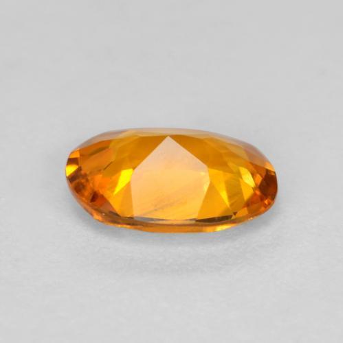 Clinohumita laranja natural 0,41ct, corte oval, VS
