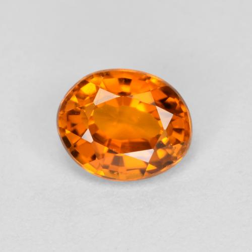 Clinohumita laranja natural 0,38ct, corte oval, VS