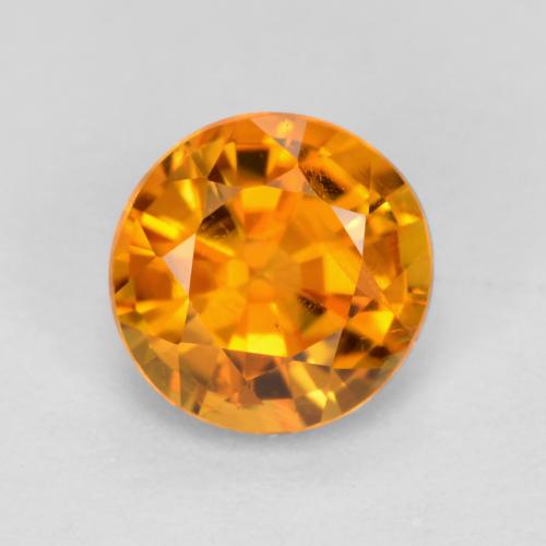 Clinohumita laranja natural 0,48ct, corte redondo, VS