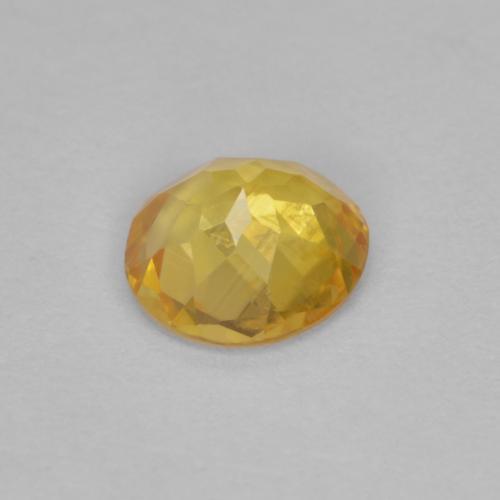 Clinohumita amarelo natural 0,57ct, corte redondo, VS-SI