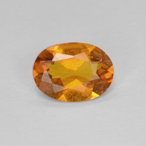 Clinohumita laranja natural 0,94ct, corte oval, SI