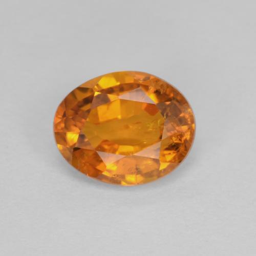 Clinohumita laranja natural 0,91ct, corte oval, SI
