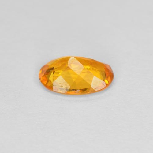 Clinohumita damasco laranja Natural 0.60ct, Corte Oval, SI