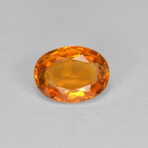 Clinohumita laranja natural 0,81ct, corte oval, VS-SI