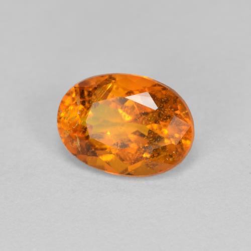 Clinohumita laranja natural 1,15ct, corte oval, SI