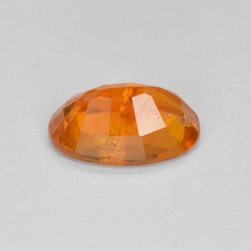 Clinohumita laranja natural 1,19ct, corte oval, SI-I1