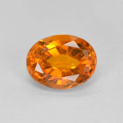 Clinohumita laranja natural 1,38ct, corte oval, VS-SI