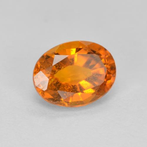Clinohumita laranja natural 1,38ct, corte oval, VS-SI