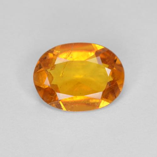 Clinohumita laranja natural 1,00ct, corte oval, SI