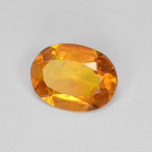 Clinohumita laranja natural 1,00ct, corte oval, SI