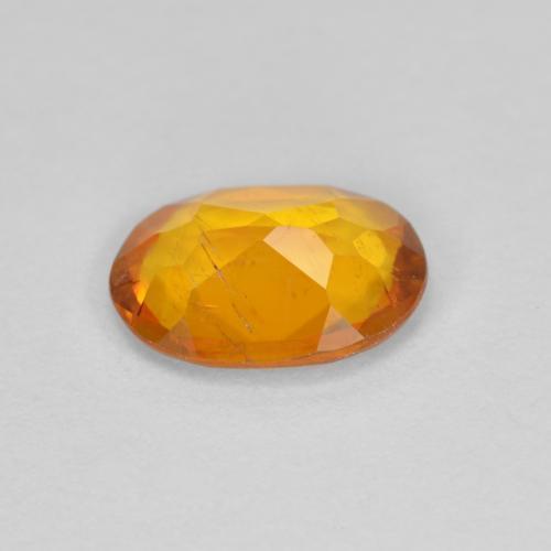 Clinohumita laranja natural 1,00ct, corte oval, SI