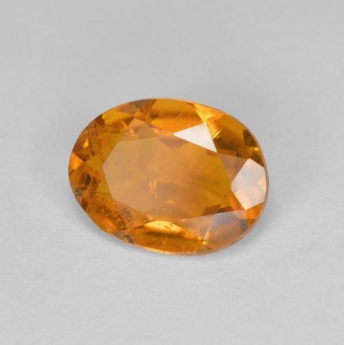 Clinohumita damasco laranja Natural 1.20ct, Corte Oval, SI