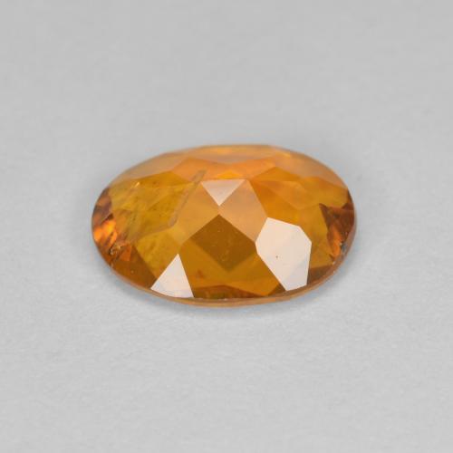 Clinohumita damasco laranja Natural 1.20ct, Corte Oval, SI