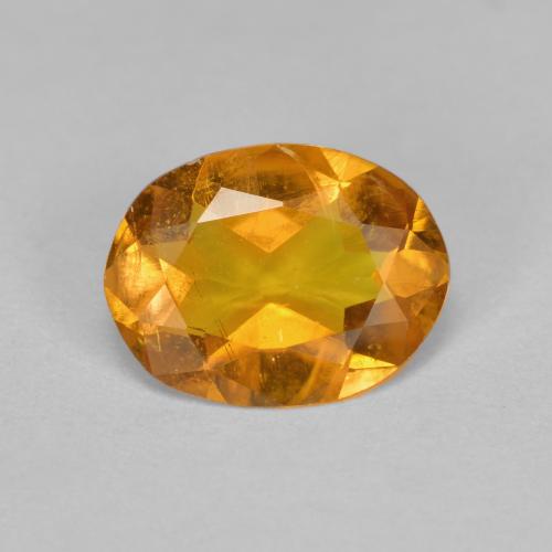 Clinohumita laranja natural 1,33ct, corte oval, SI