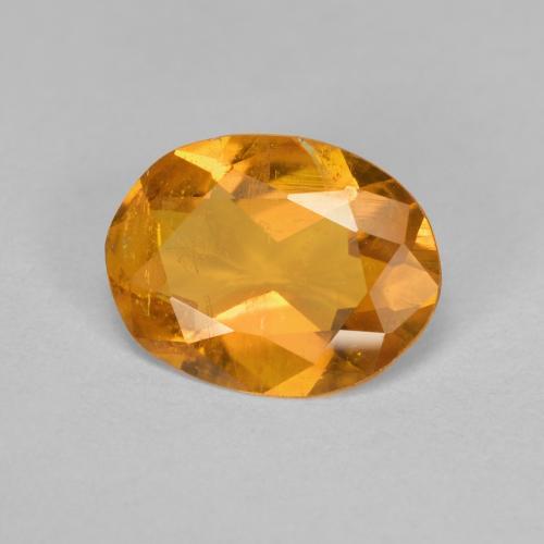 Clinohumita laranja natural 1,33ct, corte oval, SI