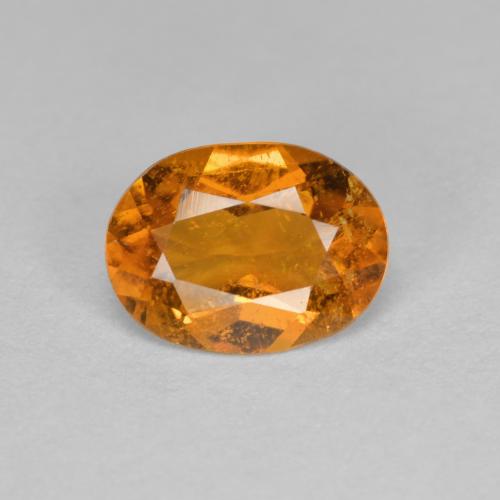 Clinohumita Laranja Médio Natural 1.21ct, Corte Oval, SI
