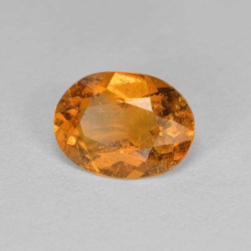 Clinohumita Laranja Médio Natural 1.21ct, Corte Oval, SI