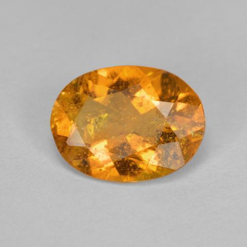 Clinohumita laranja natural 1,43ct, corte oval, SI