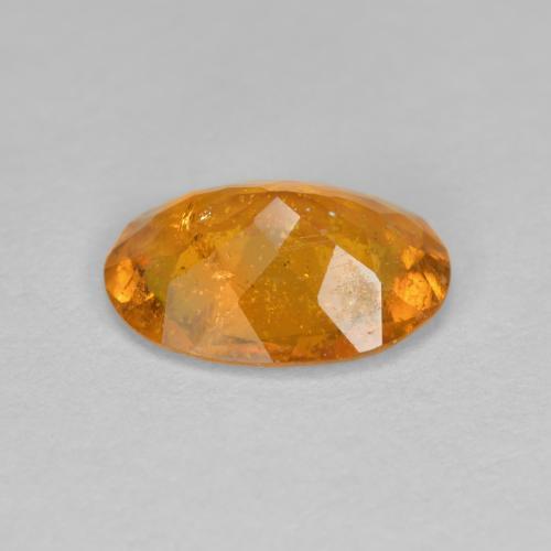 Clinohumita laranja natural 1,43ct, corte oval, SI