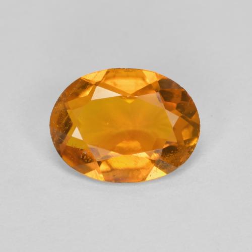 Clinohumita laranja natural 1,34ct, corte oval, SI