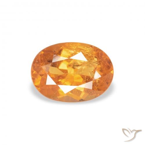 0.87ct Natural Laranja Médio Clinohumita, oval, SI