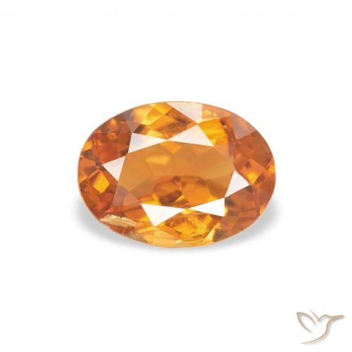 0.70ct Natural damasco laranja Clinohumita, oval, SI
