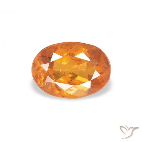 0.76ct Natural laranja avermelhado Clinohumita, oval, SI
