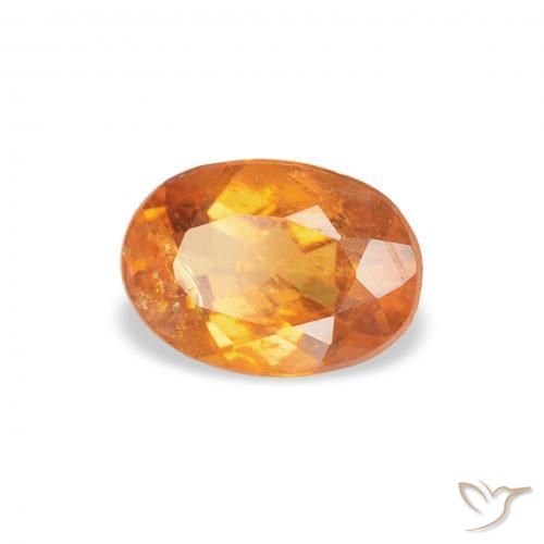 Clinohumita laranja avermelhado Natural 0.76ct, oval, SI