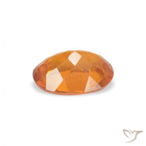 Clinohumita laranja avermelhado Natural 0.76ct, oval, SI