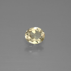 Diasporo de mudança de cor amarelo natural 0,59ct, corte oval, VS
