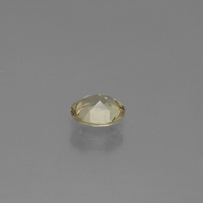 Diasporo de mudança de cor amarelo natural 0,59ct, corte oval, VS