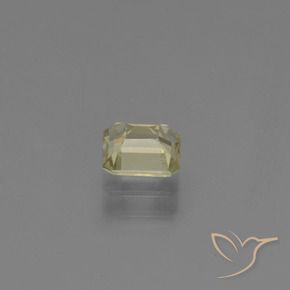 Diasporo de mudança de cor amarelo natural 0,85ct, corte esmeralda, VVS-VS