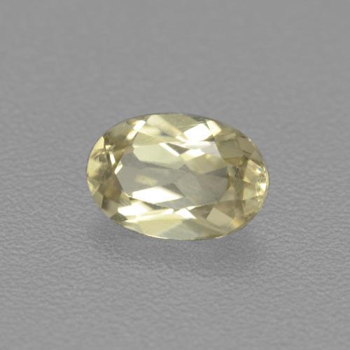 Diasporo de mudança de cor amarelo natural 0,54ct, corte oval, VS