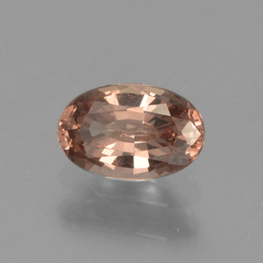 Granada de mudança de cor marrom natural 0,59ct, corte oval, VS