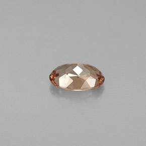 Granada que muda de cor Marrom Dourado a Laranja Natural 0.57ct, Corte Oval, VS