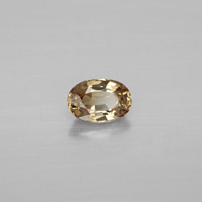Granada de mudança de cor dourado natural 0,69ct, corte oval, VVS-VS
