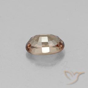 Granada de mudança de cor marrom natural 0,71ct, corte oval, VVS-VS