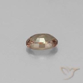 Granada de mudança de cor amarelo natural 0,63ct, corte oval, VVS-VS